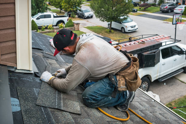 Professional Roofing technician working in Mc Graws, WV